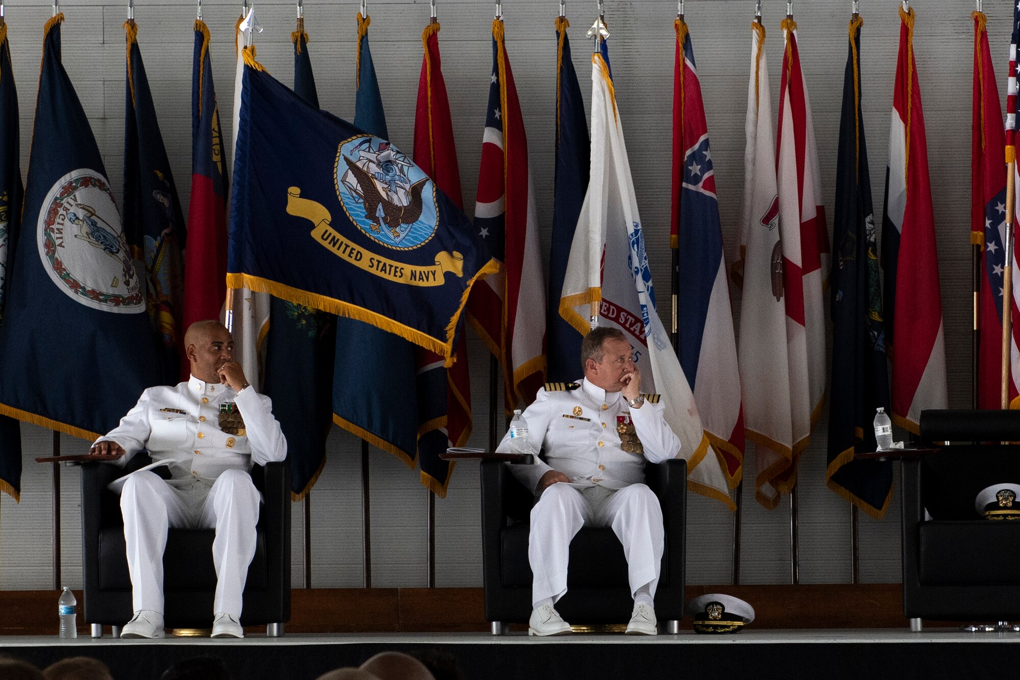 U.S. Navy leadership listens to the VFA-101 deactivation ceremony speaker Eglin Air Force Base, Florida, May 23, 2019.