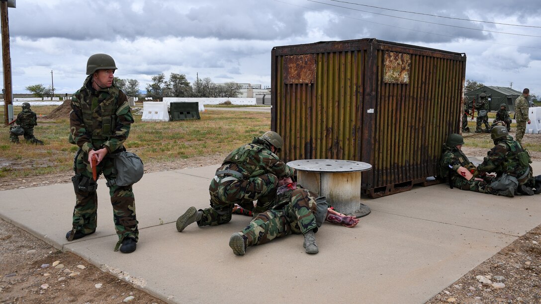 Airmen respond to simulated casualties during a Contracting Directorate field exercise at Hill Air Force Base, Utah, May 22, 2019. The exercise simulated scenarios specific to the contracting mission in a deployed environment. Contracting specialists purchase supplies and services essential to operational continiuty and mission success. (U.S. Air Force photo by R. Nial Bradshaw)