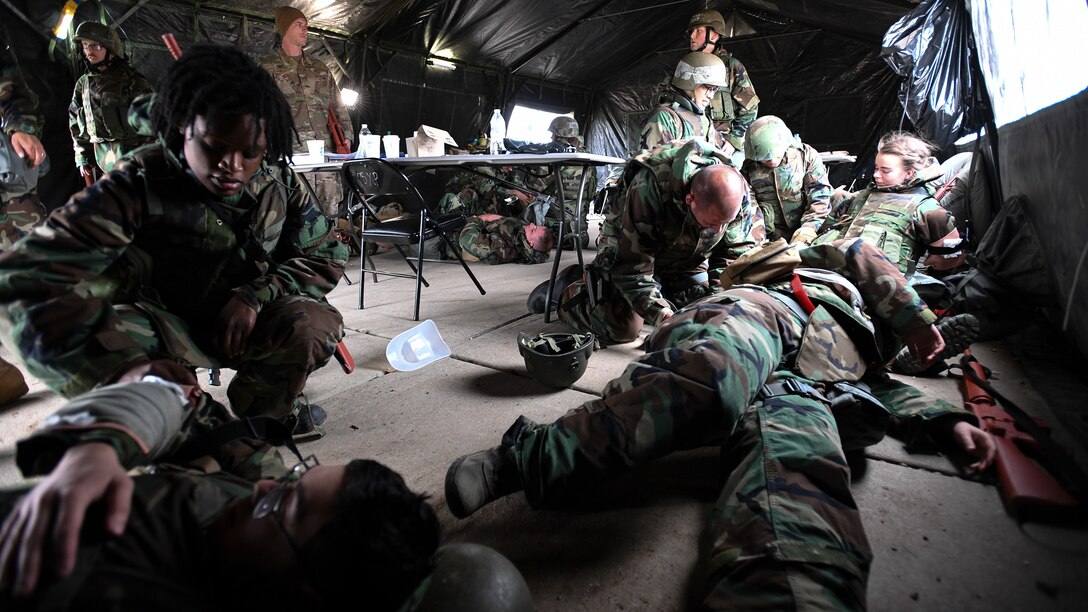 Airmen respond to simulated casualties during a Contracting Directorate field exercise at Hill Air Force Base, Utah, May 22, 2019. The exercise simulated scenarios specific to the contracting mission in a deployed environment. Contracting specialists purchase supplies and services essential to operational continiuty and mission success. (U.S. Air Force photo by R. Nial Bradshaw)
