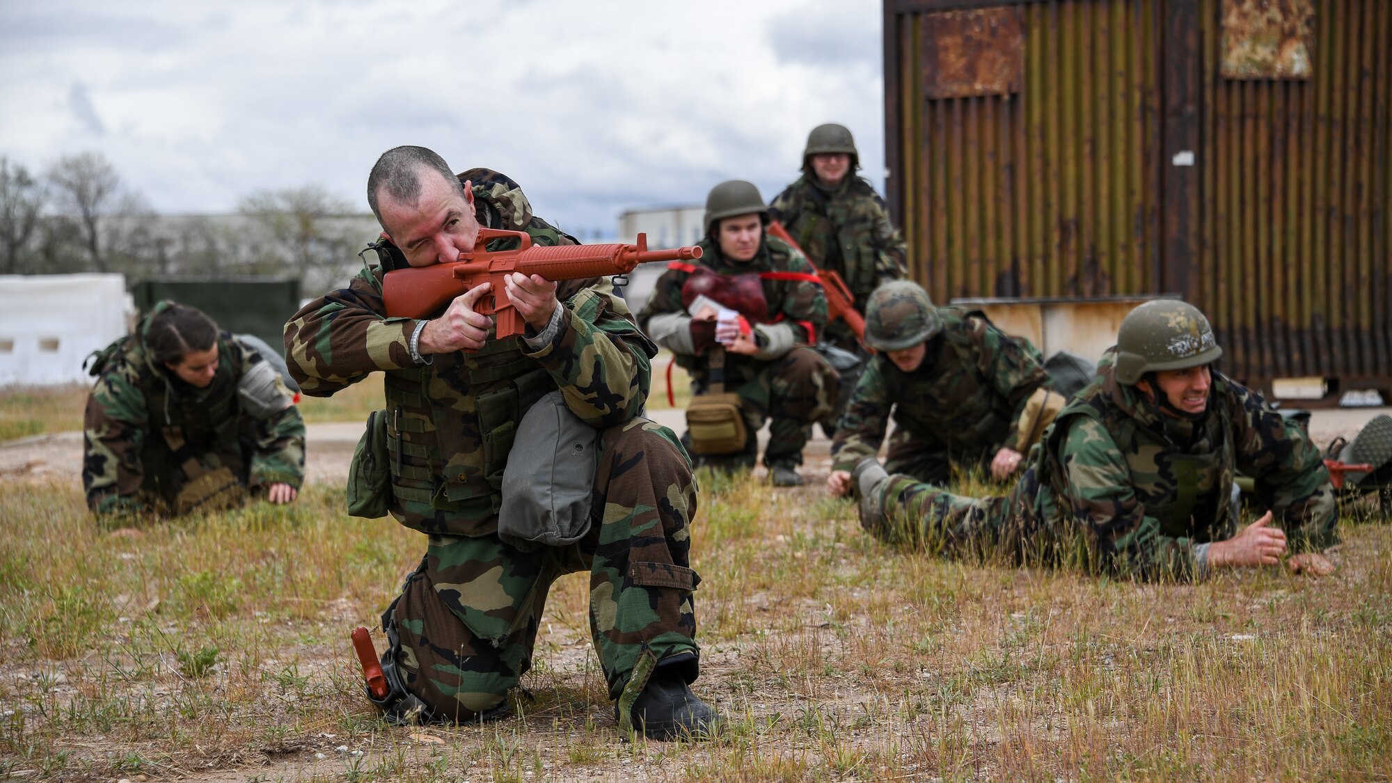 Airmen respond to an attack during an Contracting Directorate field exercise at Hill Air Force Base, Utah, May 22, 2019. The exercise simulated scenarios specific to the contracting mission in a deployed environment. Contracting specialists purchase supplies and services essential to operational continiuty and mission success. (U.S. Air Force photo by R. Nial Bradshaw)