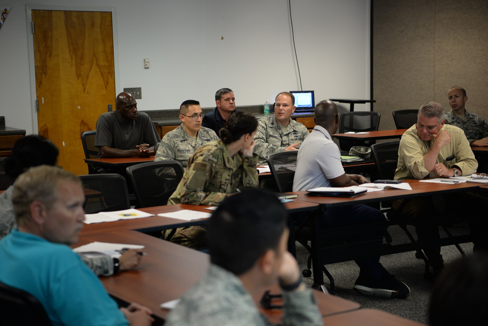 U.S Air Force Maj. Matthew Roberts, 81st Logistics Readiness Squadron commander, discusses changes being made to Keesler's hurricane plan during an emergency management working group inside the Sablich Center at Keesler Air Force Base, Mississippi, May 21, 2019. This emergency management working group was centered around Keesler's hurricane plan where base personnel discussed changes to the evacuation procedures, hurricane ride-out team sizes and more. (U.S Air Force Photo by Airman 1st Class Spencer Tobler)