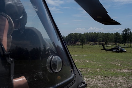 A HH-60 Blackhawk lands at the site of a simulated aircraft crash during a search and rescue exercise May 21, 2019, in Comayagua, Honduras. Members from various units on Joint Task Force – Bravo participated in the exercise that simulated a HH-60 Blackhawk crashed during a routine flight carrying personnel. The exercise practiced notification, recall, search and rescue, on-scene medical care, recovery of personnel from low and high angle austere terrain, and medical care once the injured returned to base. (U.S. Air Force photo by Staff Sgt. Eric Summers Jr.)