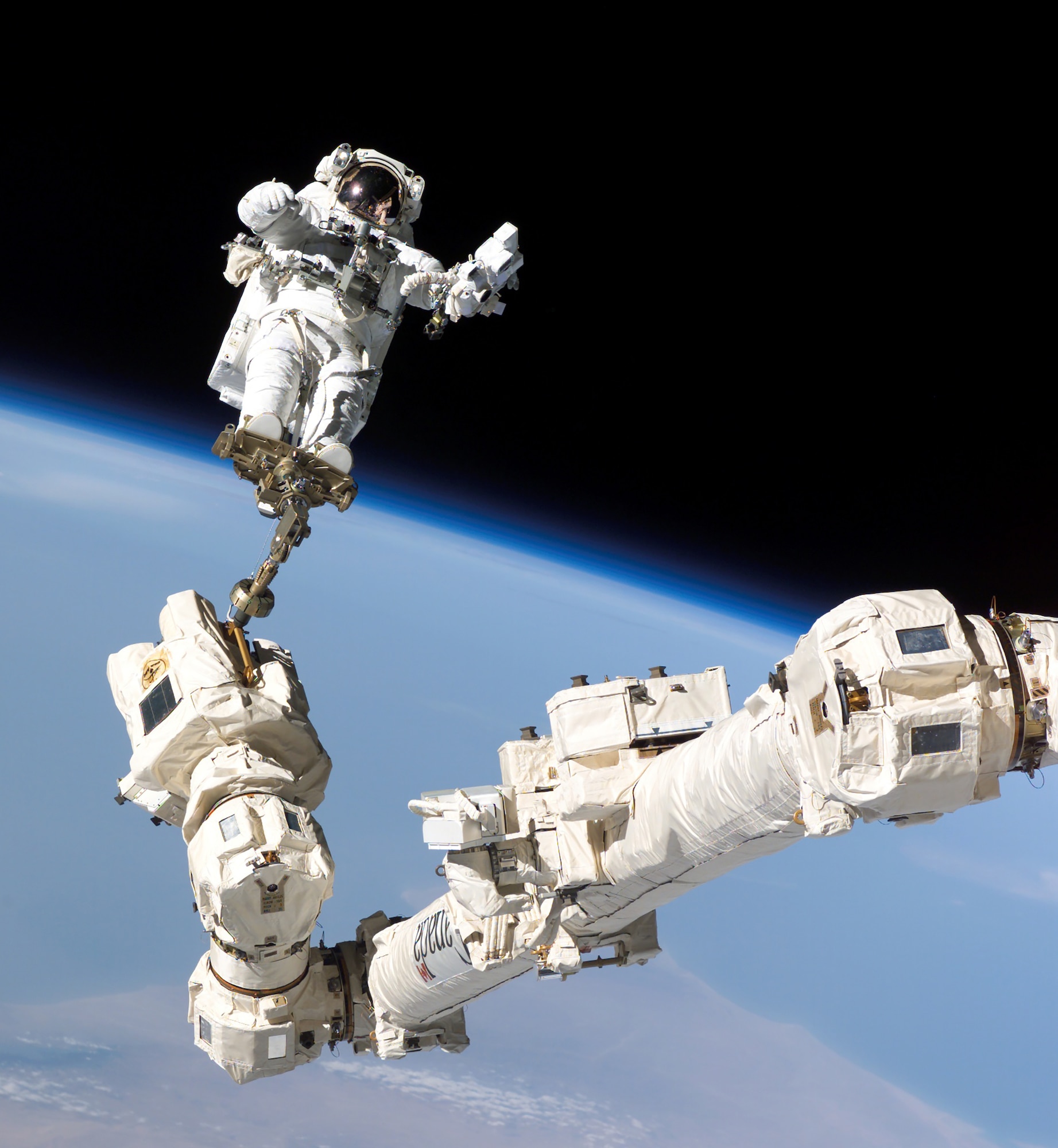 The Space Shuttle’s robotic arm served as a work platform for astronauts.(Contributed photo)