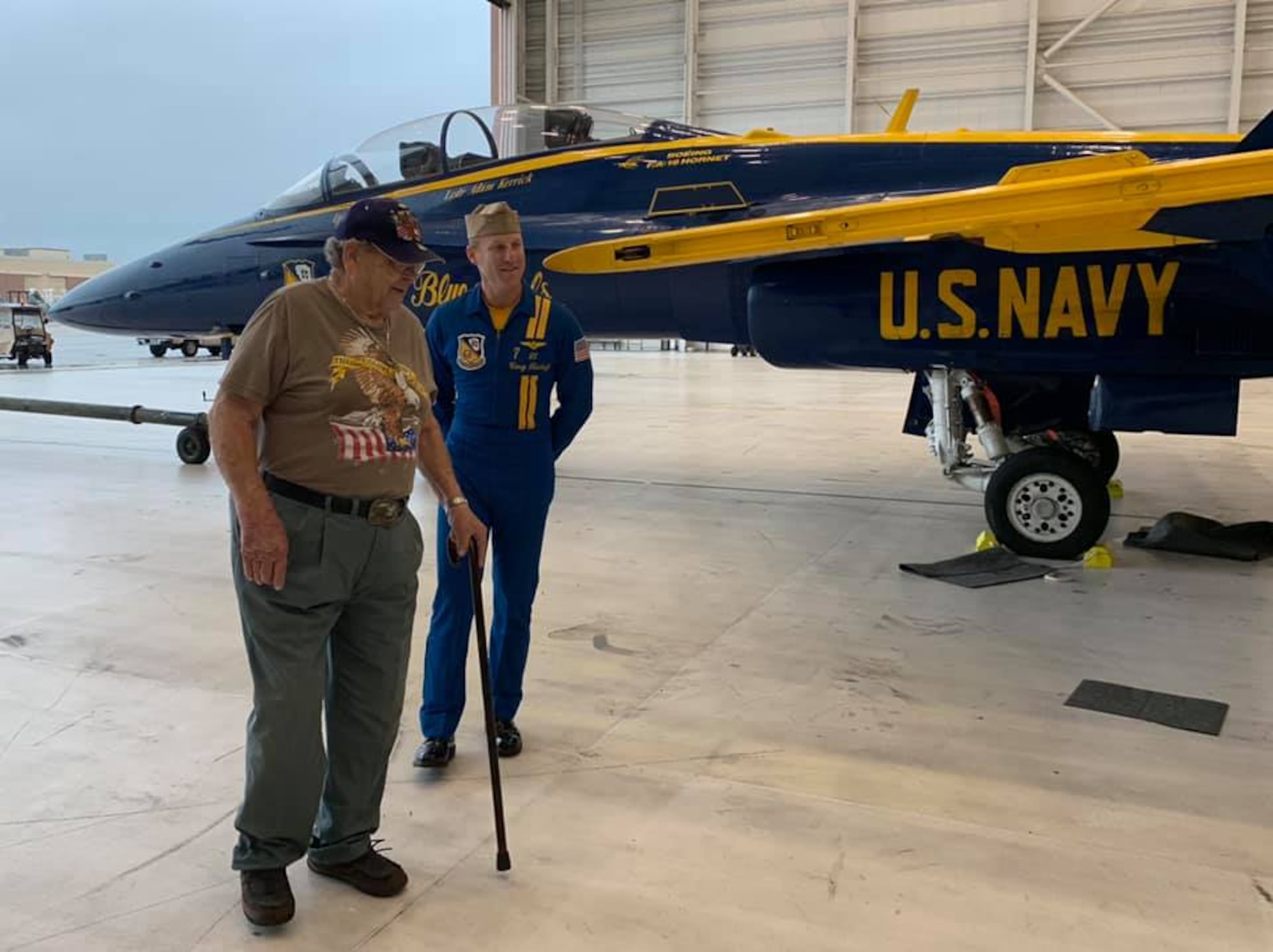 World War II veteran Robert Henley gets an up close view of Blue Angels #7 with pilot Lt. Cary Rickoff.