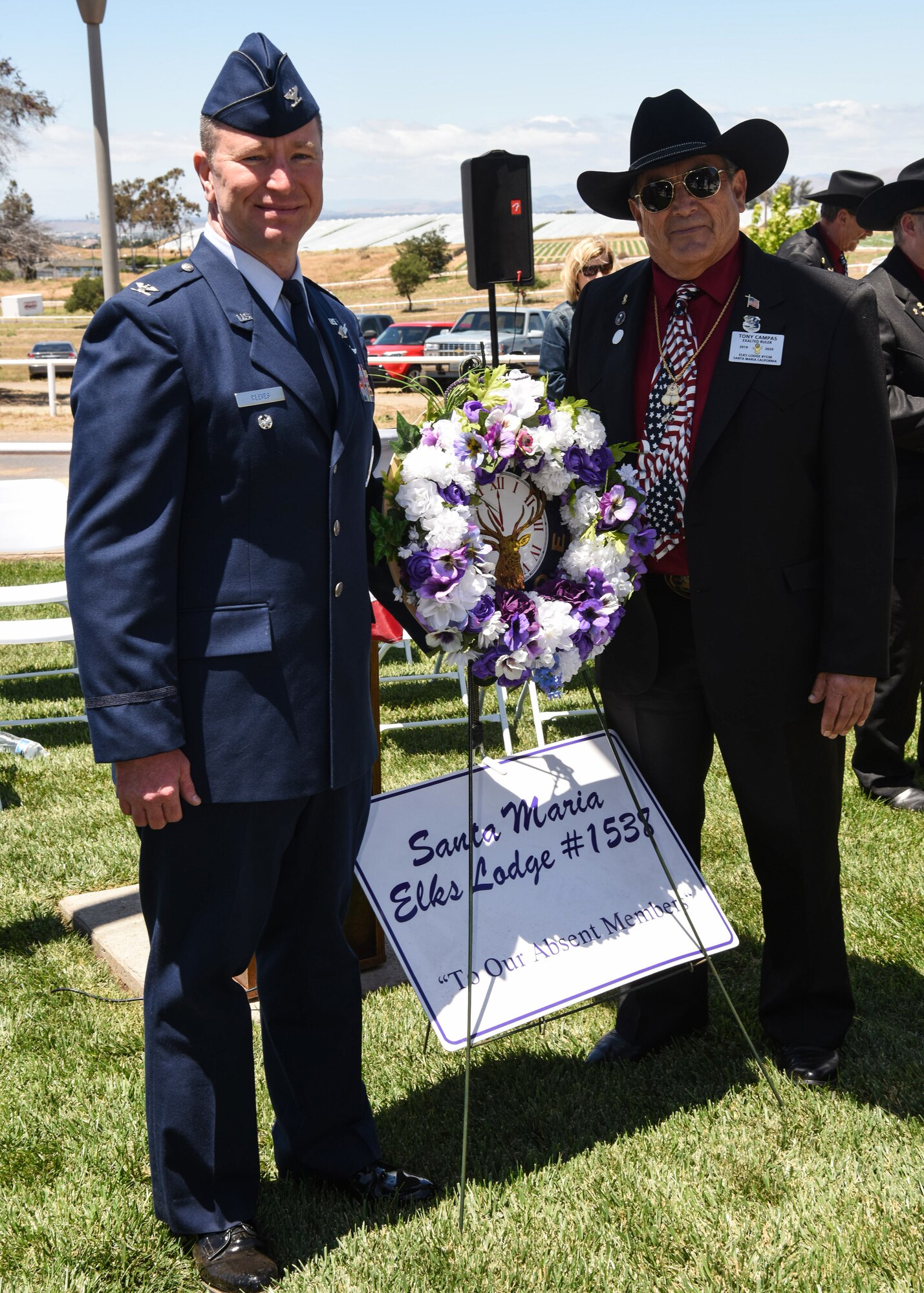 Col. Bob Reeves, 30th Space Wing vice commander poses with Tony Campas, Santa Maria Elks Lodge exalted ruler during a Memorial Day ceremony held at the Elks Rodeo grounds in Sana Maria, Calif.