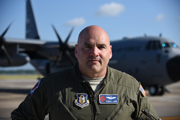 Maj. Kendall Dunn, 53rd Weather Reconnaissance Squadron pilot, poses for a photo in front of a WC-130J Super Hercules at Keesler Air Force Base, Mississippi, May 30, 2019. The 53rd WRS aka Air Force Reserve ‘Hurricane Hunters,’ is the only Air Force unit tasked with mission of flying into the eye of hurricanes to collect data from the inside of a storm. (U.S. Air Force photo by Tech. Sgt. Christopher Carranza)