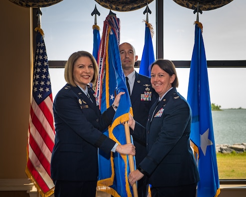 U.S. Air Force Maj. Gen. Mary F. O’Brien, Twenty-Fifth Air Force commander, passes the guidon to Col. Melissa A. Stone during the 363d Intelligence, Surveillance and Reconnaissance Wing assumption of command ceremony at Joint Base Langley-Eustis, Virginia, May 30, 2019. The 363d ISRW conducts lethal, resilient and ready operations across four key mission areas: analysis of air, space and cyber operations; full-spectrum targeting; special operations ISR; and ISR testing, tactics development and advanced training. (U.S. Air Force photo by Senior Airman Nin Leclerec)