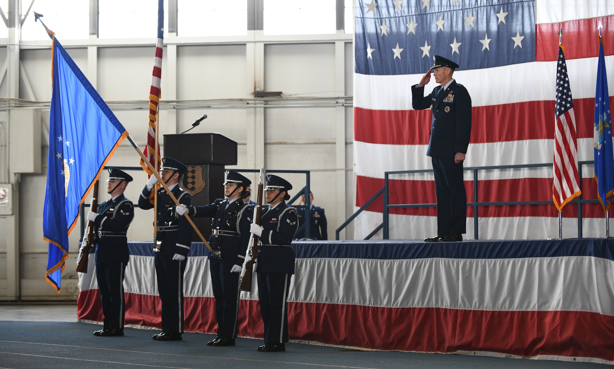 Maj. Gen. James Dawkins Jr., the 8th Air Force commander, salutes as the Honor Guard presents the colors, during a change of command ceremony at Ellsworth Air Force Base, S.D., May 30, 2019. The ceremony is a time-honored military tradition that serves as representation of the exchange of responsibility and authority from one commander to another. (U.S. Air Force photo by Airman 1st Class Christina Bennett)