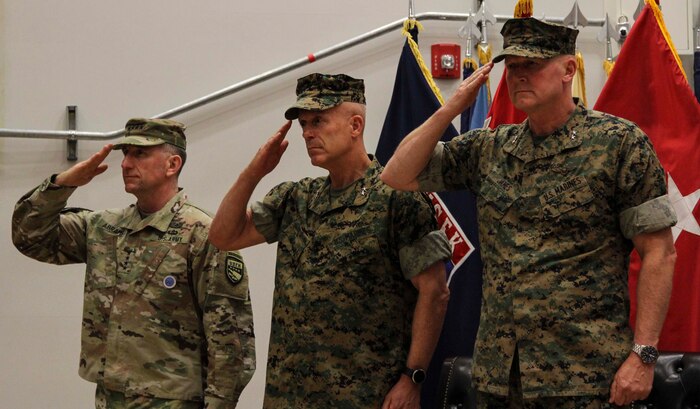 CAMP HUMPHREYS, Republic of Korea – Gen. Robert Abrams (left), commander of United States Forces Korea, Maj. Gen. Patrick J. Hermesmann (center), former commander of U.S. Marine Corps Forces Korea, and Maj. Gen. Bradley S. James (right), commander of Marine Forces Korea, salute for colors during a change of command ceremony here, 30 May. Hermesmann relinquished command to James after leading Marines on the Korean peninsula for more than a year while building upon the ROK and U.S. Alliance. Additional photos can be seen on the MARFORK webpage on DVIDS at the following address: https://www.dvidshub.net/unit/MARFORK(Official U.S. Marine Corps photo by Sgt. Nathaniel Hanscom/Released)