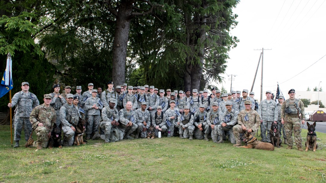 Participants pose for a photo after Yokota’s 2019 National Police Week 5K Ruck March, May 20, 2019, at Yokota Air Base, Japan.