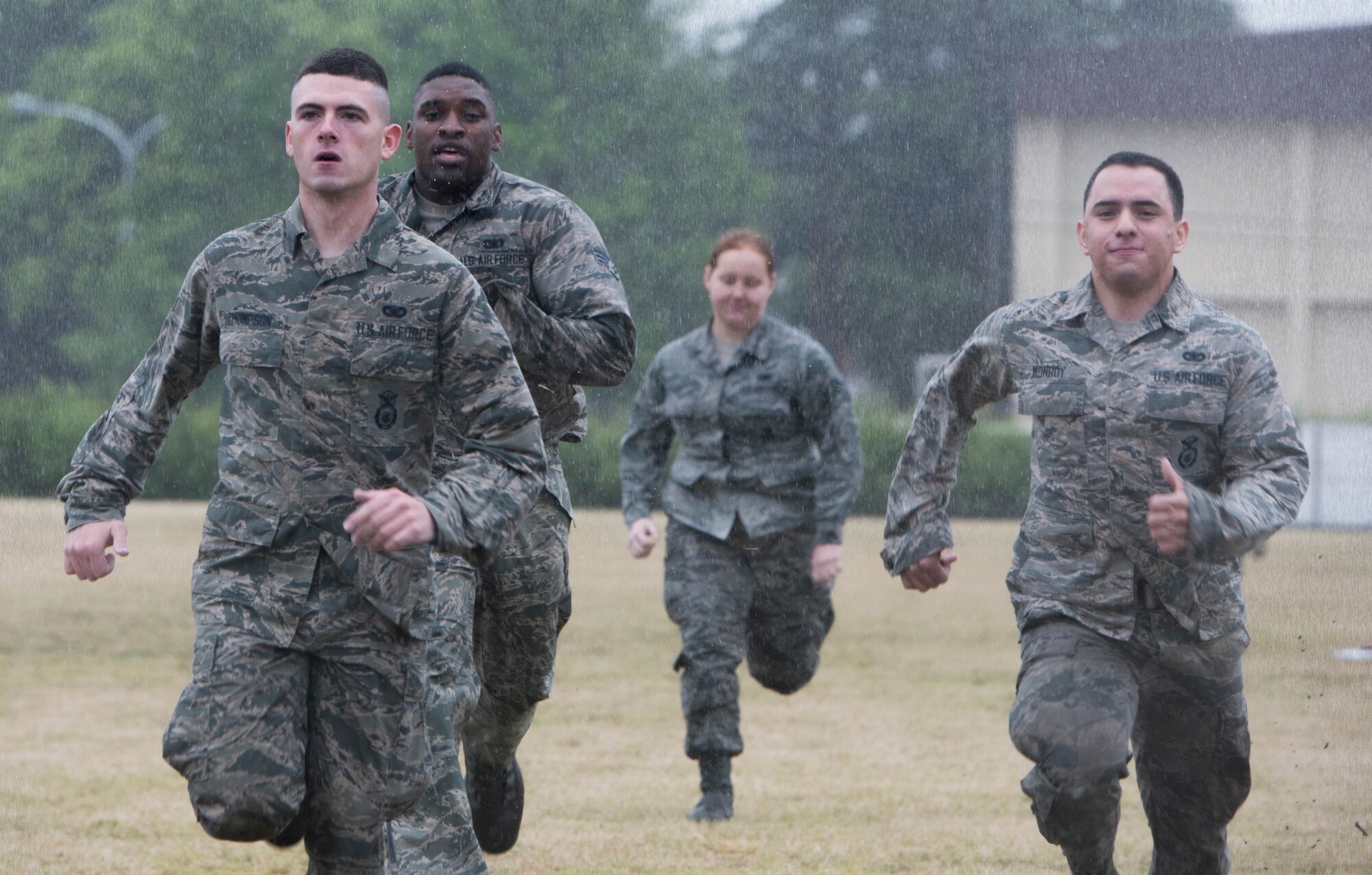 Airmen from 374th Security Forces Squadron run during the Defenders Challenge as part of National Police Week at Yokota Air Base, Japan, May 21, 2019.