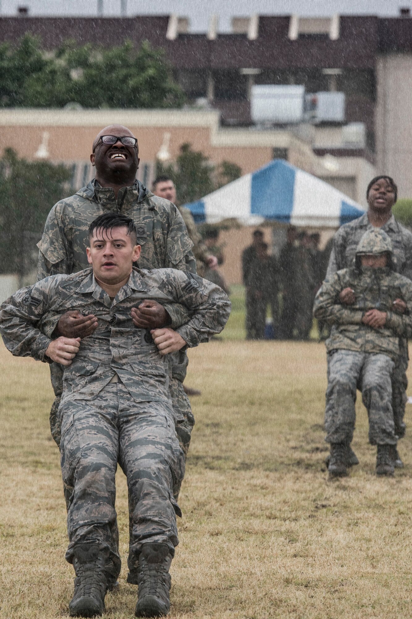 Master Sgt. Tyson Turner, 374th Security Forces Squadron flight chief, performs a buddy drag during Yokota’s 2019 National Police Week Defenders Challenge at Yokota Air Base, Japan, May 21, 2019.