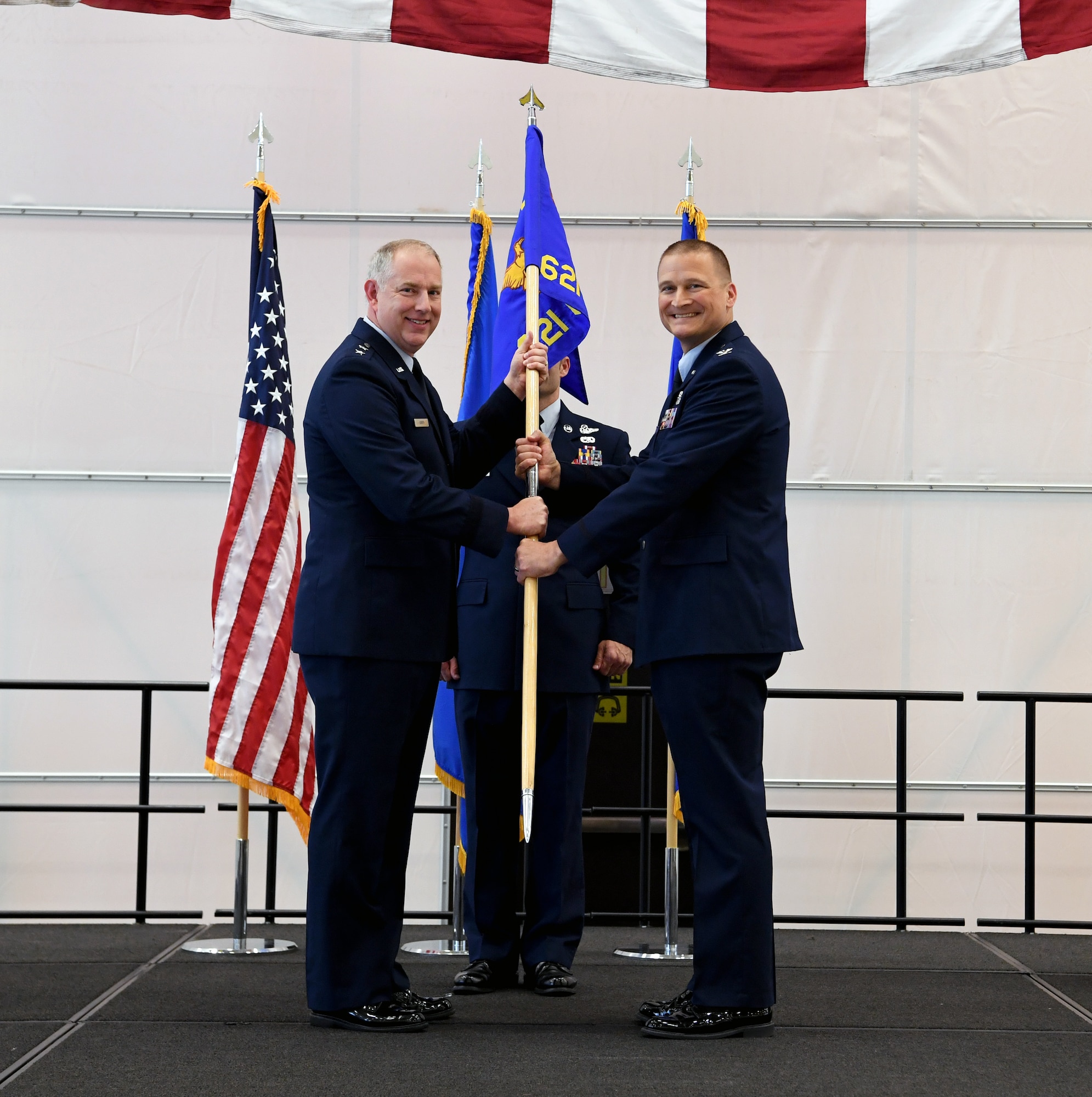 Col. Douglas Jackson assumes command of the 621st Contingency Response Wing during an assumption of command ceremony at Joint Base McGuire-Dix-Lakehurst, New Jersey May 30. Maj. Gen. John Gordy, U.S. Air Force Expeditionary Center commander, presided over the ceremony. (U.S. Air Force photo by Tech. Sgt. Luther Mitchell)