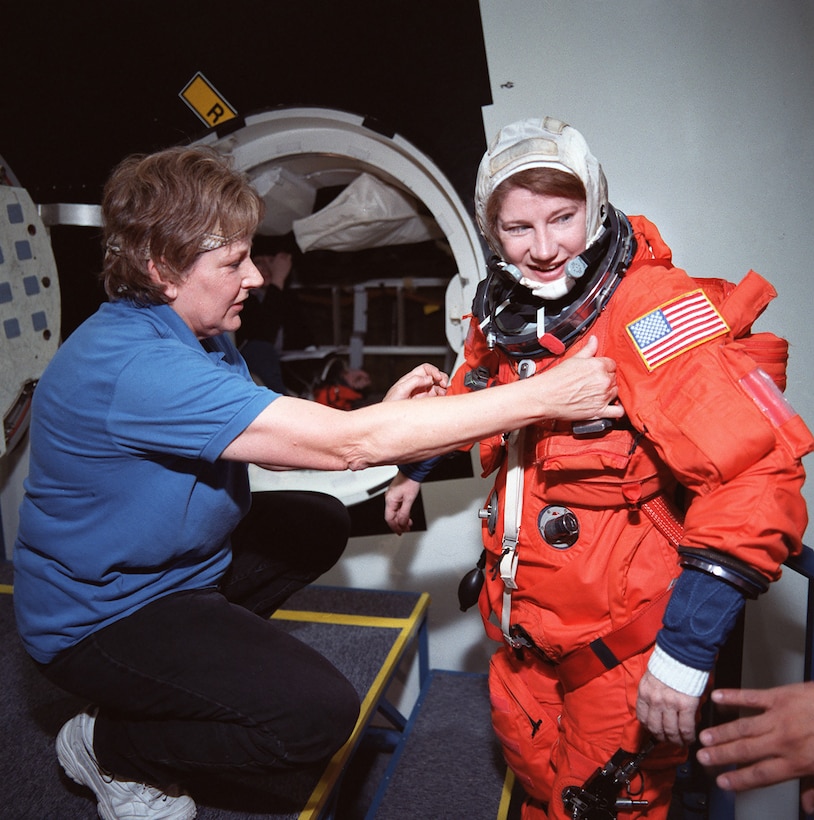 Air Force astronaut Col. (later Lt. Gen.) Susan J. Helms prepares for Space Shuttle training in an ACES suit before mission STS-101, March 7, 2000.(Contributed photo)