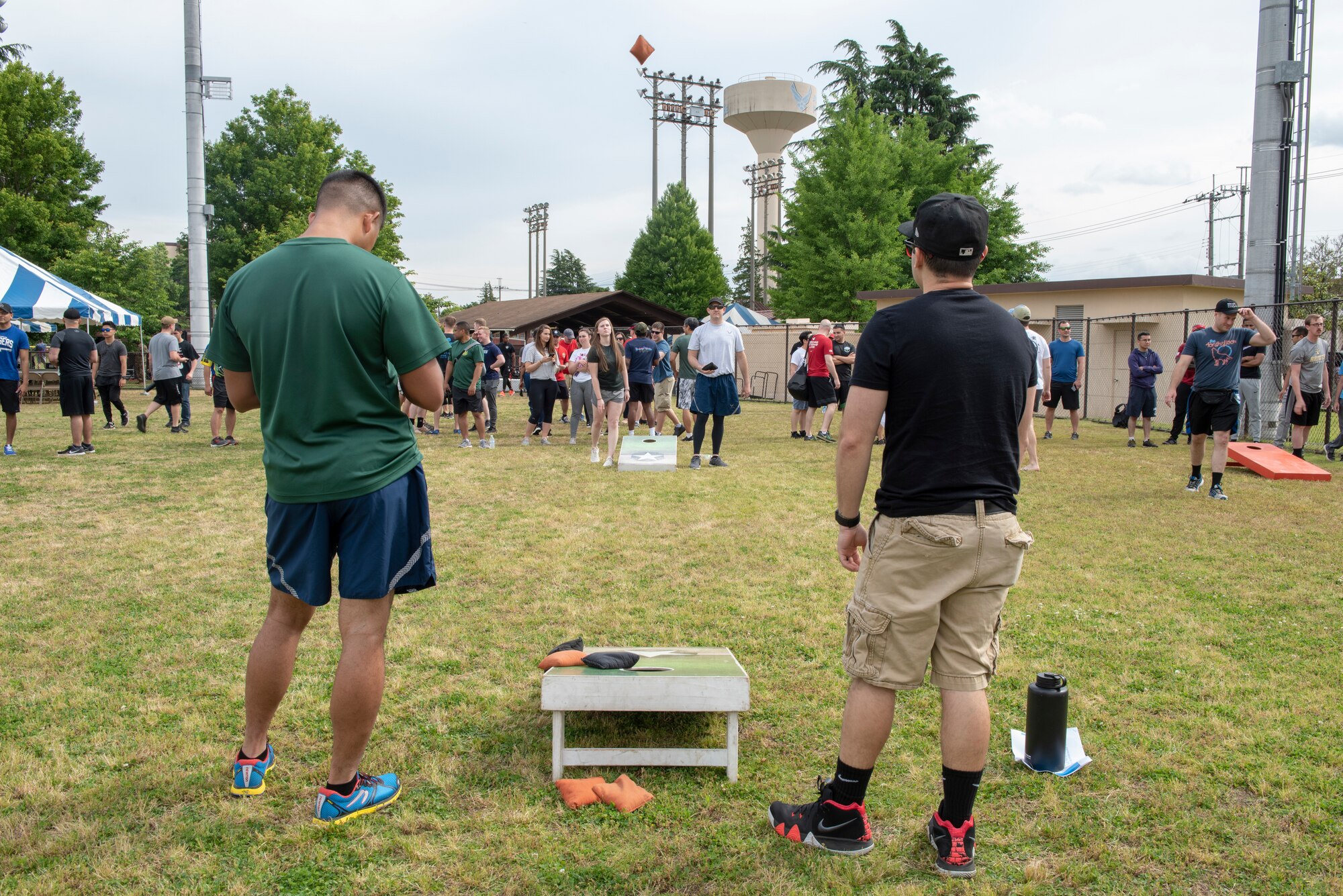 Members of Team Yokota play a friendly game of cornhole during Airman Appreciation Day at Yokota Air Base, Japan, May 31, 2019.