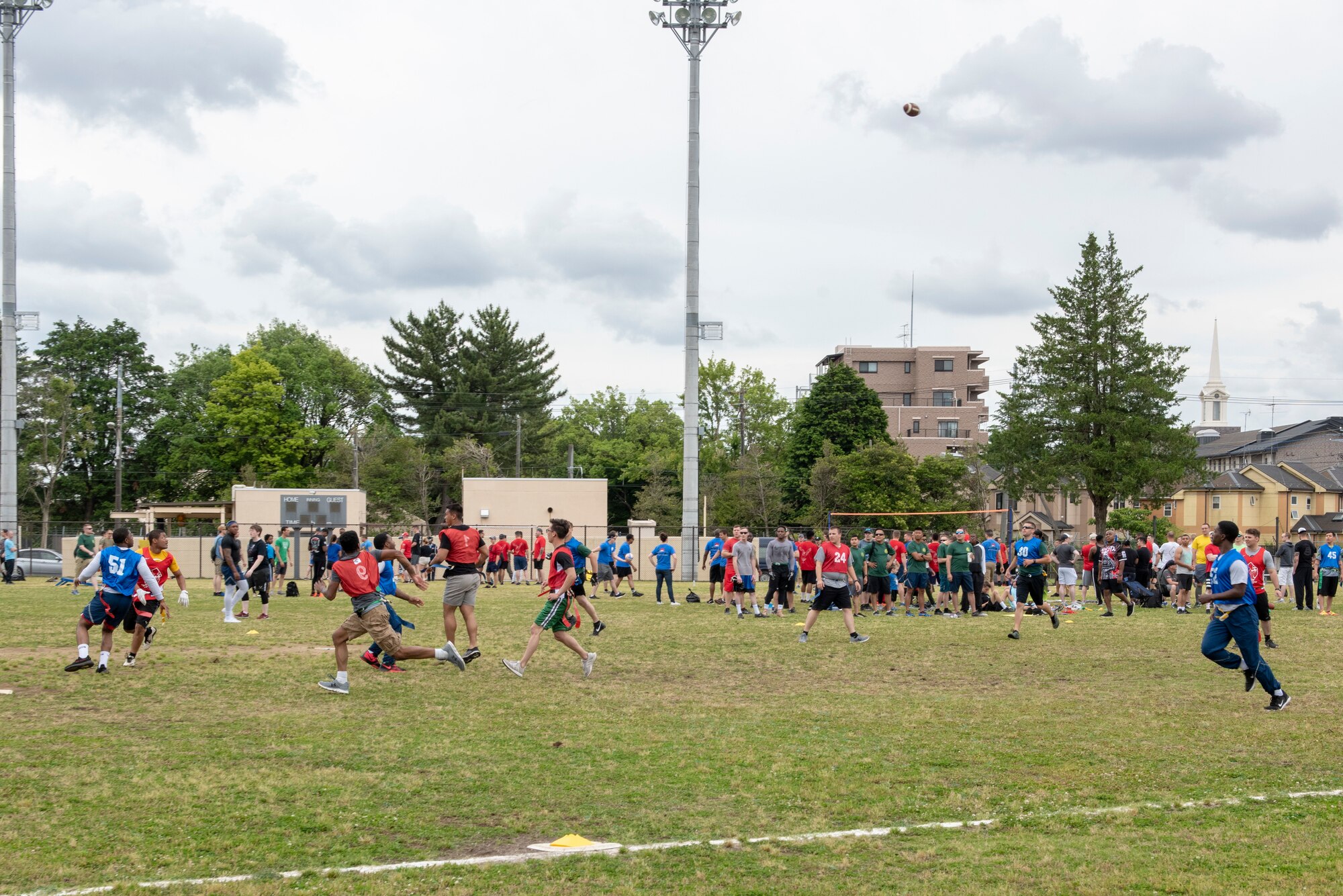 Airmen compete in a flag football tournament during Airman Appreciation Day at Yokota Air Base, Japan, May 31, 2019