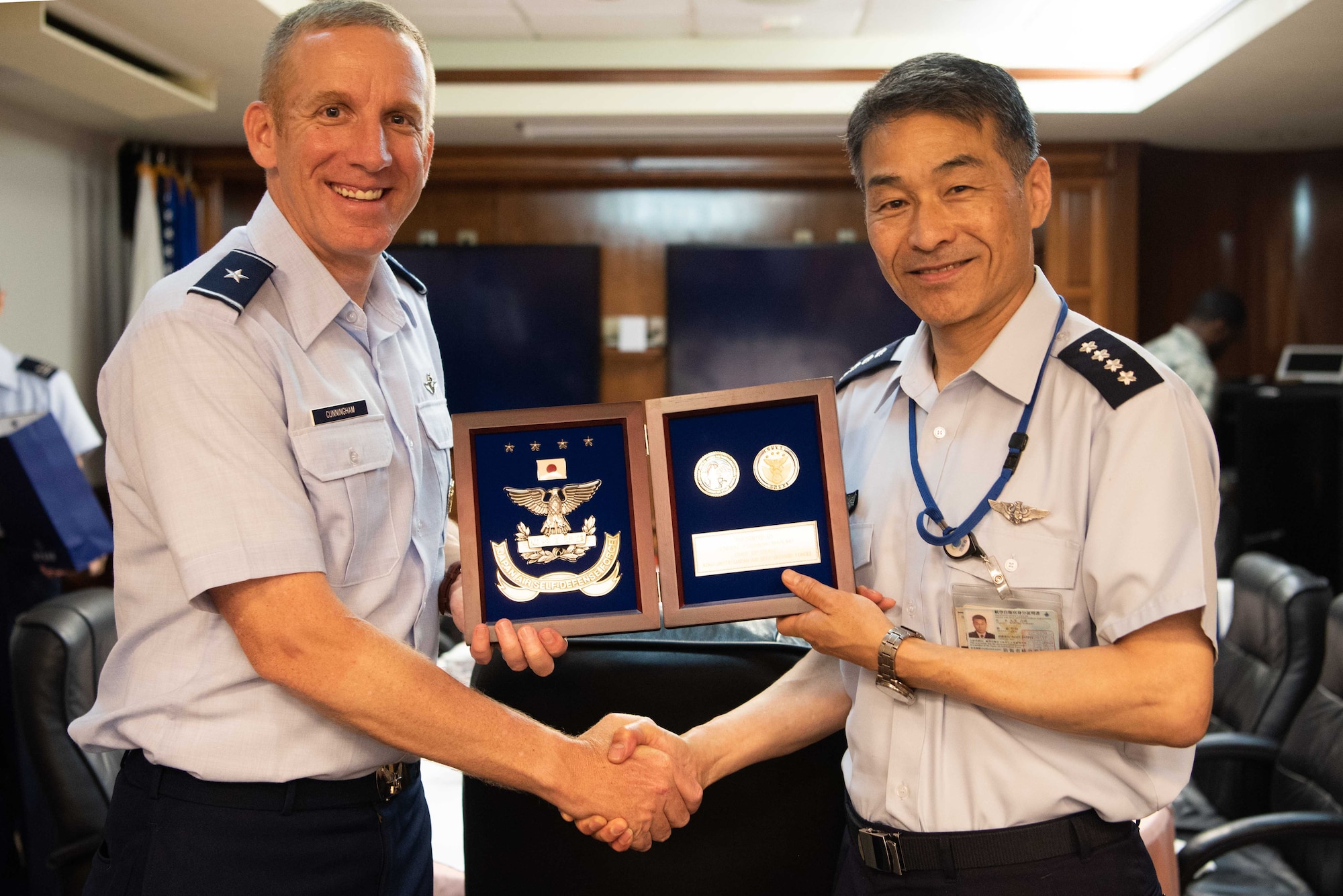 U.S. Air Force Brig. Gen. Case Cunningham, 18th Wing commander explains the origin of Kadena Air Base Habu Hill to Japan Air Self -Defense Force Chief of Staff Gen. Yoshinari Marumo, during a visit to Kadena AB, Japan, May 21, 2019. While visiting, Cunningham and Marumo discussed key topics, such as the vital role of both U.S. and Japanese Airmen in ensuring regional security and stability. (U.S. Air Force photo by Senior Airman Kristan Campbell)