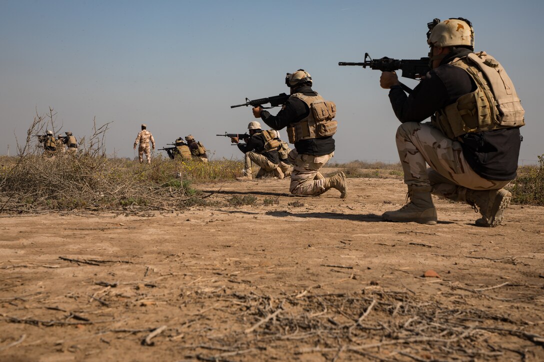 An Iraqi instructor from the School of Infantry NCO2 (SINCO2) conducts an exercise with Iraqi army soldiers in which they conduct proper patrol formations, section attacks, and support by fire actions at Camp Taji, Iraq, Mar. 05, 2019. The soldiers are under the supervision of Iraqi instructors from SINCO2 with oversight from Australian army trainers from Task Group Taji 8. Task Group Taji 8 is a combined Australian-New Zealand Task Group that provides the Iraqi Security Forces with training to help stabilize areas cleared of Daesh. The Iraqi Army School of Infantry NCO 2 recently achieved initial operating capability, meaning that the school can perform 75 percent of its operations without Coalition assistance.