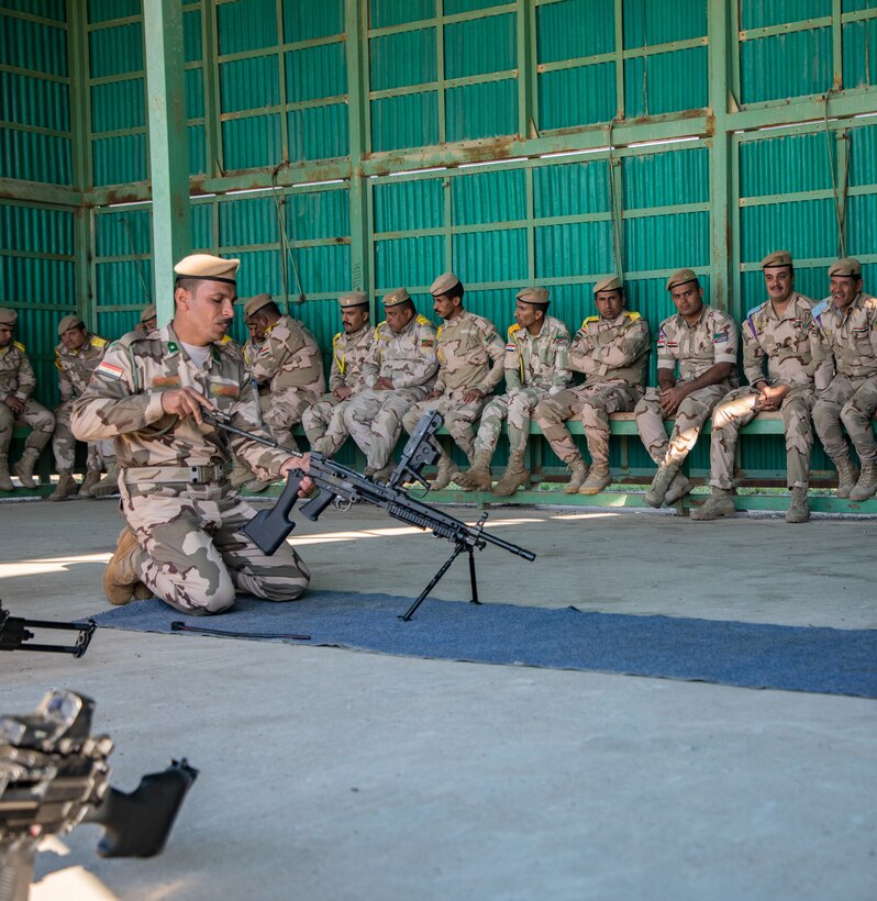 Iraqi instructors from the 2nd Non-Commission Officer School of Infantry train Iraqi army soldiers on the proper way to strip and assemble the M240B machine gun and the M249 light machine gun at Camp Taji, Iraq, Mar. 19, 2019. The soldiers are under the supervision of Australian army trainers from Task Group Taji 8, which is a combined Australian-New Zealand Task Group that provides the Iraqi Security Forces with training to enable the stabilization of areas cleared of Daesh. The Coalition advises and assists the Iraqi Security forces in seven key security functions: security policy, security operations, training, sustainment, intelligence, counterterrorism and aviation. The Iraqi Army School of Infantry NCO 2 recently achieved initial operating capability, meaning that the school can perform 75 percent of its operations without Coalition assistance.