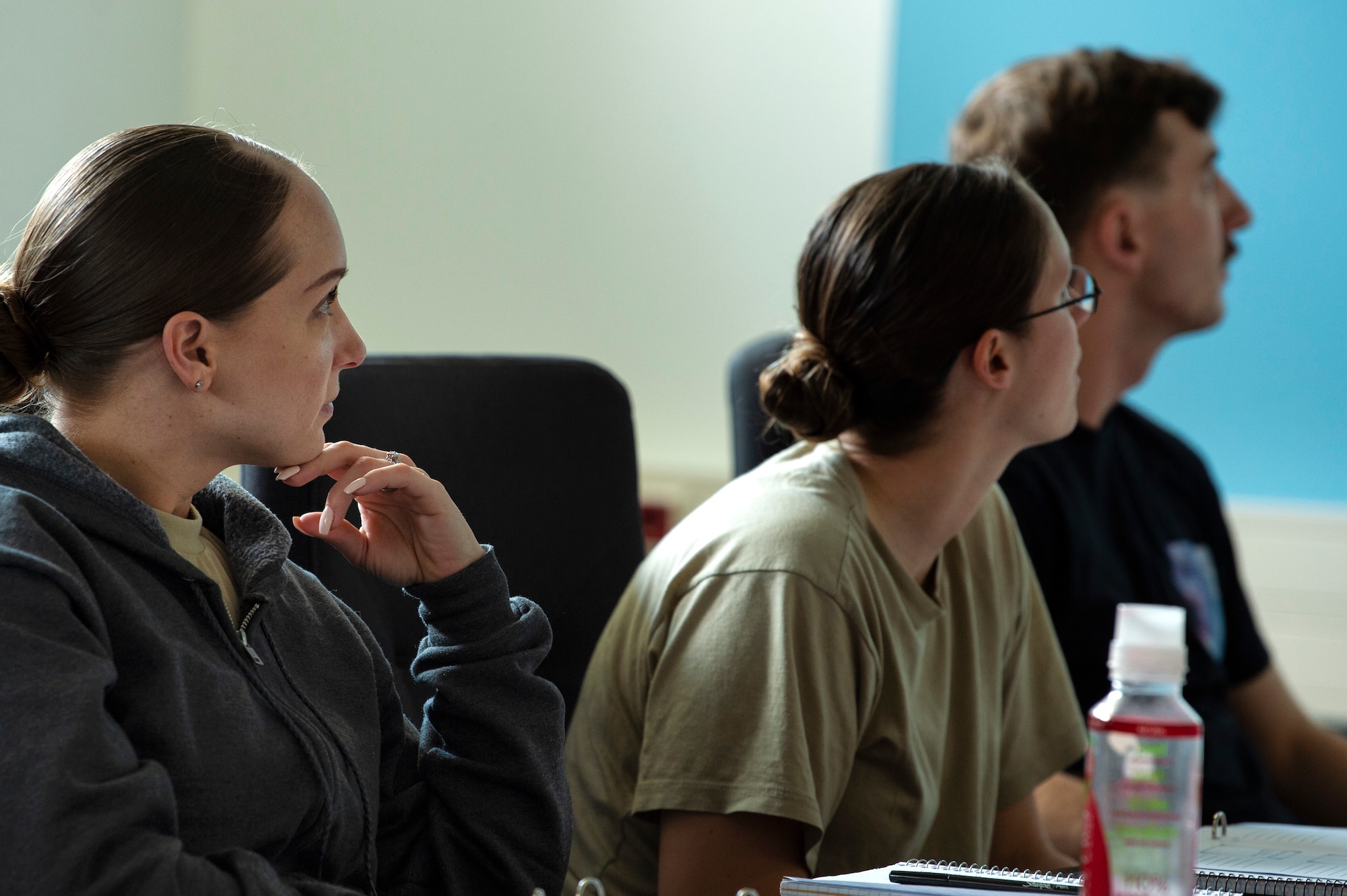 U.S. Air Force Tech. Sgt. Kandice Scott, 52nd Communications Squadron client systems NCO in charge, left, Staff Sgt. Olivia Beavers, 52nd Civil Engineer Squadron contracting officer representative of service contracts, middle, and Staff Sgt. Tyler Gulbronson, 52nd CES structural technician, right, participate in the Leaders of the Future course at Spangdahlem Air Base, Germany, May 29, 2019. The seven-week course is intended to develop leadership and management skills at the NCO level. (U.S. Air Force photo by Airman 1st Class Valerie Seelye)