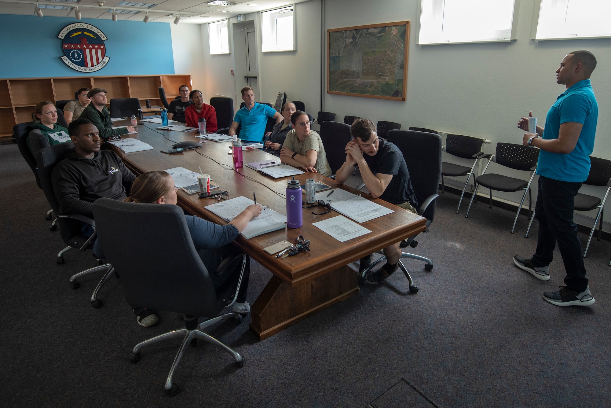 U.S. Air Force Master Sgt. Michael Roderick, 52nd Civil Engineer Squadron electrical power production NCO in charge, right, briefs a class during the Leaders of the Future course at Spangdahlem Air Base, Germany, May 29, 2019. The course covers a different topic each week, such as leadership philosophy, ethical leadership, diversity and managing change. (U.S. Air Force photo by Airman 1st Class Valerie Seelye)