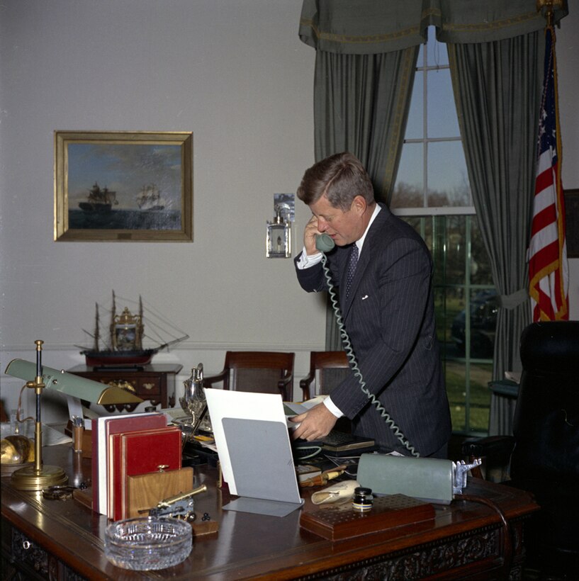 President Kennedy on phone in Oval Office