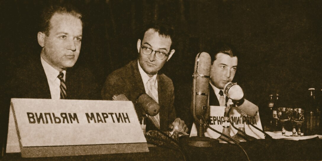 (Left) William Martin and Bernon Mitchell (Center) tell Moscow press why they defected