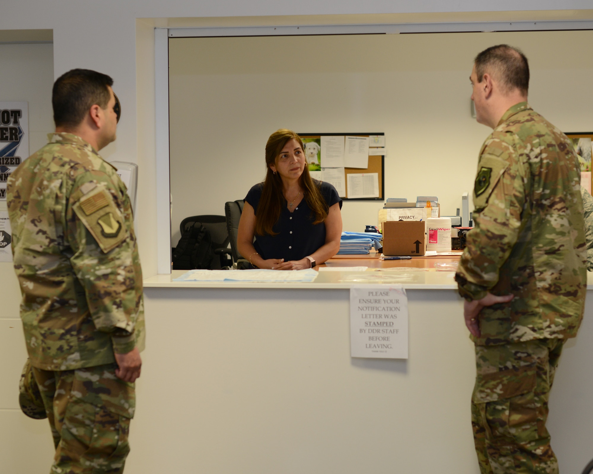Yessica Sutton, the drug testing program administrative manager, center, speaks to the 86th Airlift Wing command team on Ramstein Air Base, Germany, May 30, 2019.