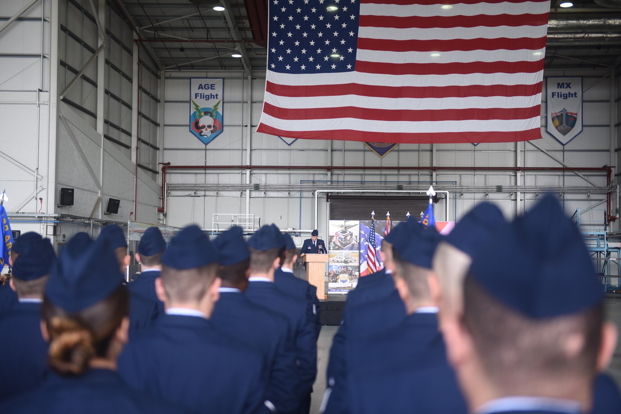 U.S. Air Force Col. Christopher Amrhein, outgoing 100th Air Refueling Wing commander, addresses the crowd at RAF Mildenhall, England, May 31, 2019. Amrhein served as the wing commander for two years. (U.S. Air Force photo by Airman 1st Class Joseph Barron)