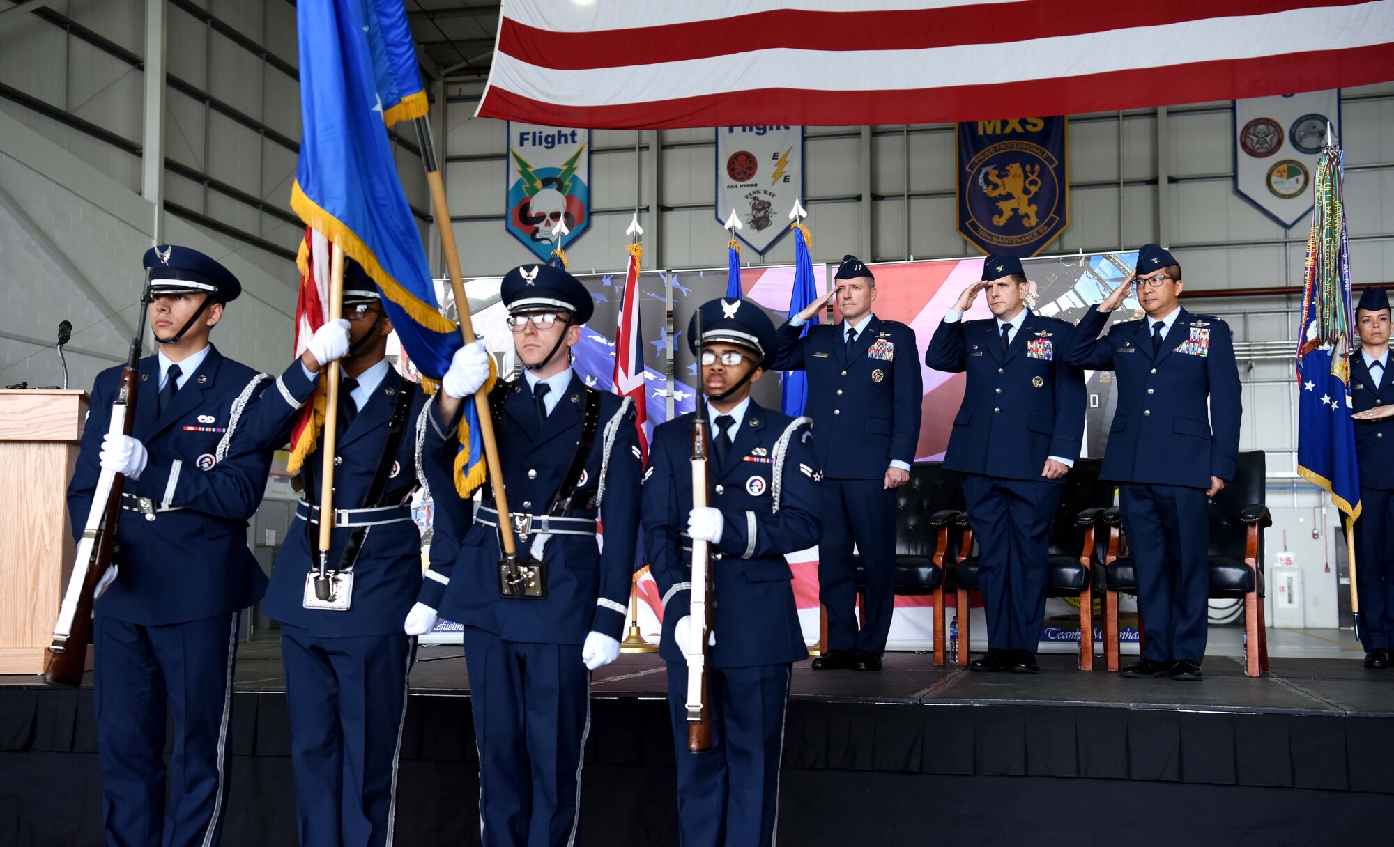 Members of the RAF Mildenhall Honor Guard present the colors during the 100th Air Refueling Wing change of command ceremony at RAF Mildenhall, England, May 31, 2019. U.S. Air Force Col. Troy Pananon, former vice commander of the 6th Air Mobility Wing at MacDill Air Force Base, Florida, took over command from Col. Christopher Amrhein, who began his command back in July 2017. (U.S. Air Force photo by Airman 1st Class Brandon Esau)