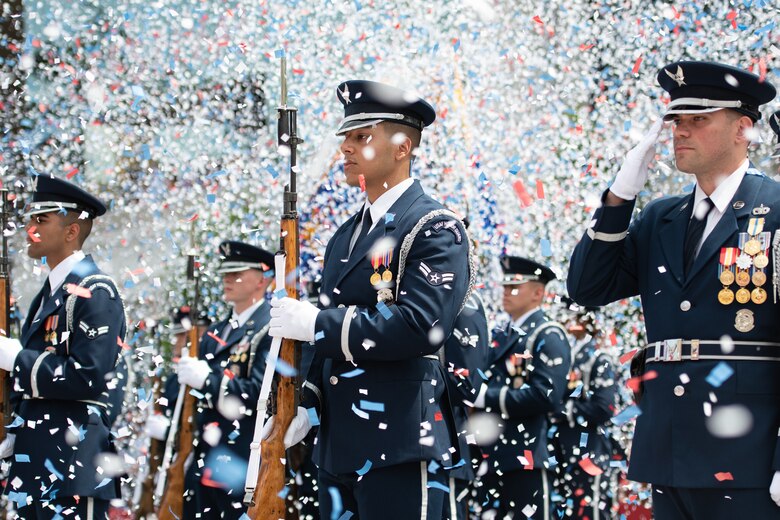 Members of the U.S. Air Force Honor Guard Drill Team stand at attention