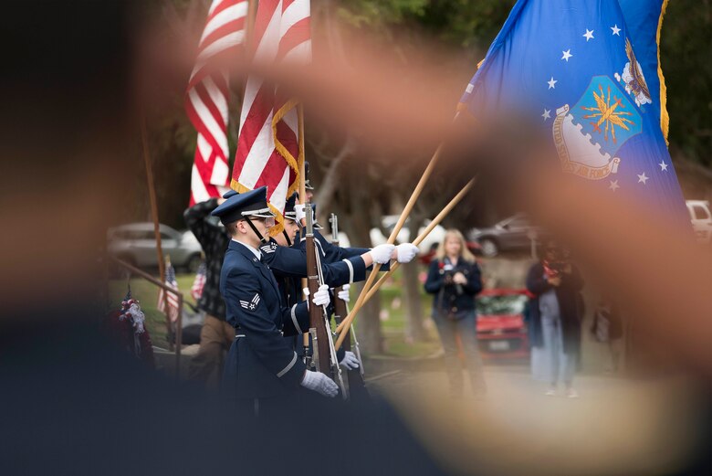 Members of the Vandenberg Air Force Base Honor Guard post the colors