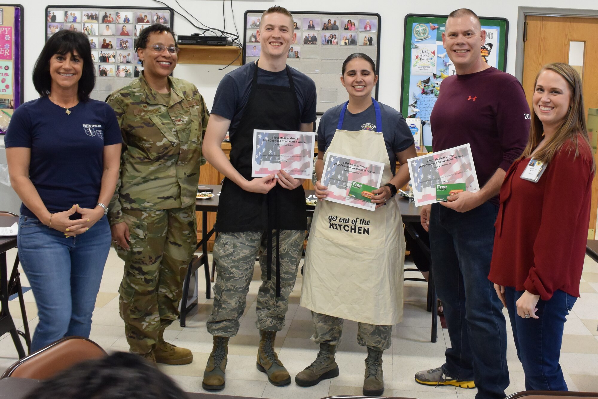 Alicia Ferris-Dannenberg, the health promotion coordinator assigned to 509th Bomb Wing Public Affairs, poses with Team What the Fork for a photo on May 3, 2019, after winning a healthy eating competition at Whiteman Air Force Base, Missouri. The 509th MDG hosted acompetition modeled after the popular show Chopped to demonstrate how easy it can be to make healthy eating choices on a budget. (Courtesy photos by Alicia Ferris-Dannenburg)