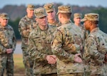 Sgt. Maj. of the Army Daniel A. Dailey (center) greets Fort Leonard Wood-based Soldiers during an installation visit Nov. 1-2, 2018.