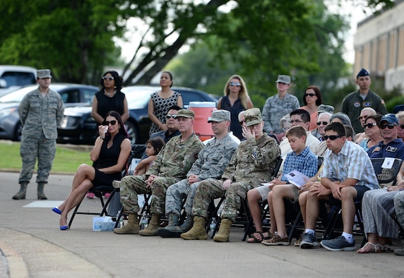 Attendees pay tribute to Master Sgt. John Chapman, Medal of Honor recipient, and 1st Lt. David Albandoz, Specialized Undergraduate Pilot Training  Class 17-14 graduate, in front of the Richard “Gene” Smith Plaza during a Memorial Day ceremony May 28, 2019, on Columbus Air Force Base, Miss. The Memorial Day ceremony honored the nation’s fallen Airmen, Soldiers, Sailors and Marines, and included a special memorial service for Chapman and Albandoz. (U.S. Air Force photo by Airman 1st Class Hannah Bean)