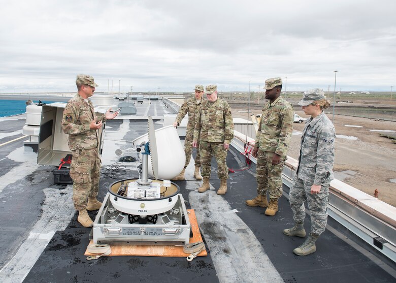 Staff Sgt. Daniel Robinson, 2nd Combat Weather Systems Squadron weather systems trainer from Hurlburt Field, Florida, explains a Doppler system to Mountain Home Air Force Base weather system personnel May 25, 2019, at Mountain Home Air Force Base. The is the first time the Doppler system has been installed on a Continental United States base. (U.S. Air Force photo by Senior Airman Tyrell Hall)