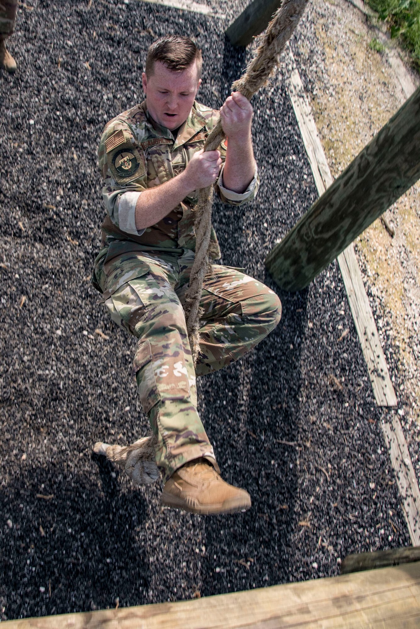 Senior Airman William McLaughlin, 502nd Security Forces Squadron combat arms instructor, competes in an obstacle course race during Police Week May 14, 2019, at Joint Base San Antonio, Texas. National Police Week dates back to 1962, when President John F. Kennedy proclaimed May 15 as National Peace Officers Memorial Day. That same year, Congress established by joint resolution the week in which May 15 falls as National Police Week.