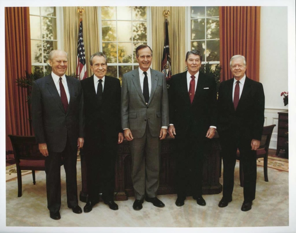 Group portrait of Presidents Ford, Nixon, Bush, Reagan and Carter in the Oval Office