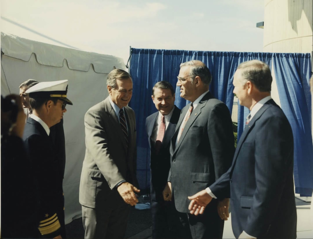 President Bush greets NSA Director Vice Admiral William O. Studeman, USN, Deputy Director Robert L. Prestel, and Chief of Staff William P. Crowell upon arrival for the NSA World Wide Awards Ceremony