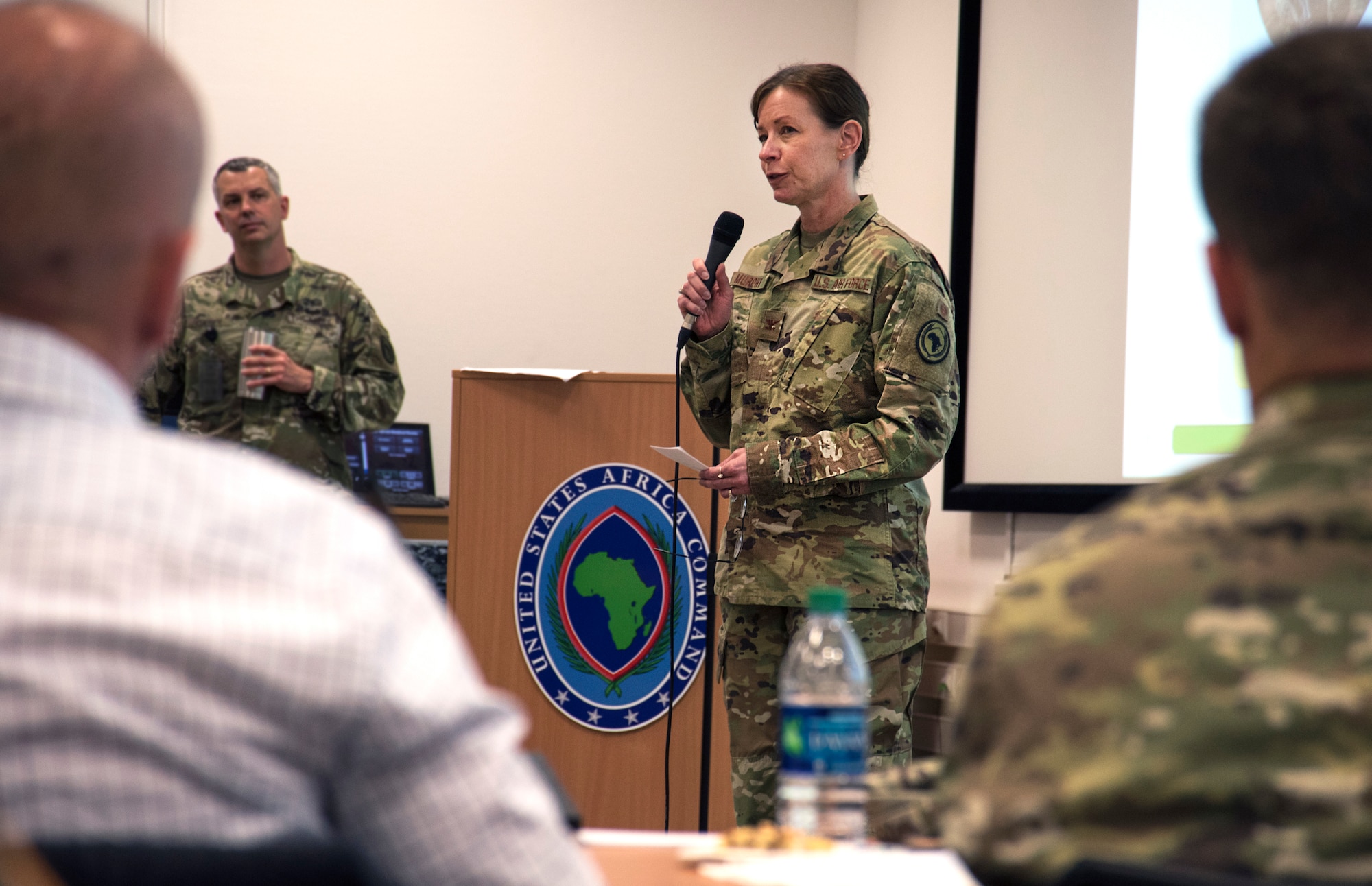 U.S. Air Force Col. Krystal Murphy, acting AFRICOM command surgeon, speaks to attendees of the 2019 U.S. Africa Command Command Surgeon Synchronization Conference in Stuttgart, Germany, May 28, 2019. Murphy talked about the importance of building relationships during the conference. (U.S. Navy photo by Mass Communication Specialist 1st Class Christopher Hurd)