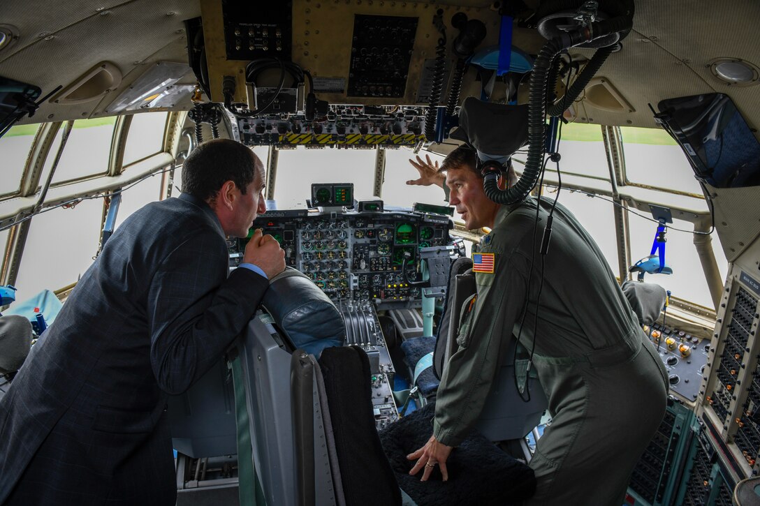 Lt. Col. John Boccieri, director of the commander’s action group here, discusses the flying capabilities of the C-130H Hercules aircraft with Zach Prager, a legislative fellow from Congressman Tim Ryan’s office, on May 29, 2019, here.
