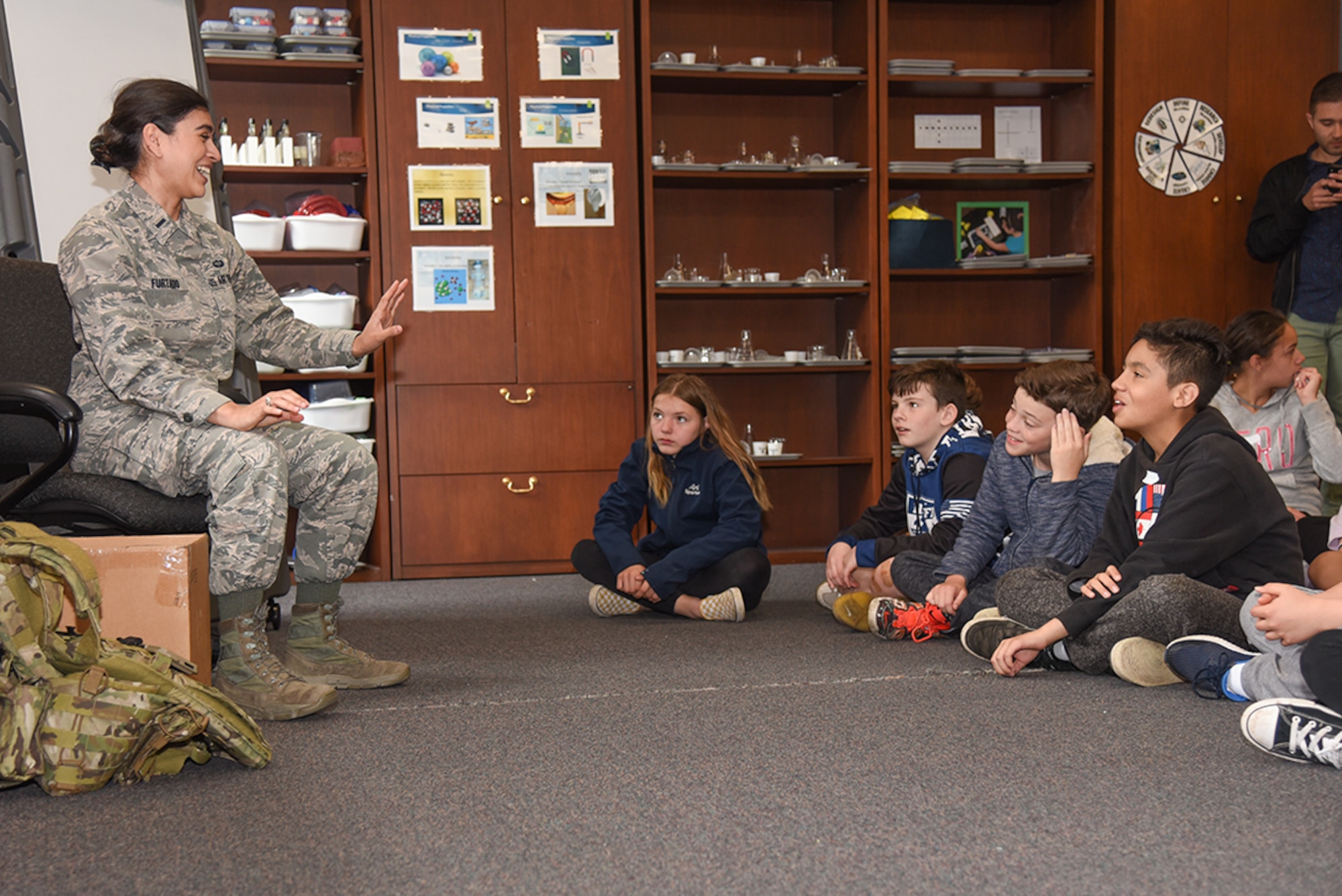 1st Lt. Jazmin Furtado, a U.S. Air Force engineer, speaks to STARBASE students from Peabody, Mass., public schools, during a presentation at Hanscom Air Force Base, Mass., May 30. Furtado demonstrated equipment and talked about her science, technology, engineering and mathematics background, and how her education at the U.S. Air Force Academy and the Massachusetts Institute of Technology prepared her for a career designing systems ground troops use to communicate with aircraft. STARBASE is a Department of Defense education program for elementary students, who are historically under-represented in STEM fields, to motivate them to explore those fields. (U.S. Air Force photo by Todd Maki)