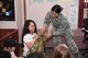 1st Lt. Jazmin Furtado, a U.S. Air Force engineer, hands a tactical vest to STARBASE student Biby Jimenez, 11, from a Peabody, Mass., public school, during a presentation at Hanscom Air Force Base, Mass., May 30. Furtado demonstrated equipment she helps design at Hanscom, and talked about her role and training in the Air Force. Her story resembles that of Capt. Carol Danvers, better known as Capt. Marvel, and Furtado used lessons of empowerment from the comic book-inspired movie to challenge the students to pursue their interests. (U.S. Air Force photo by Todd Maki)