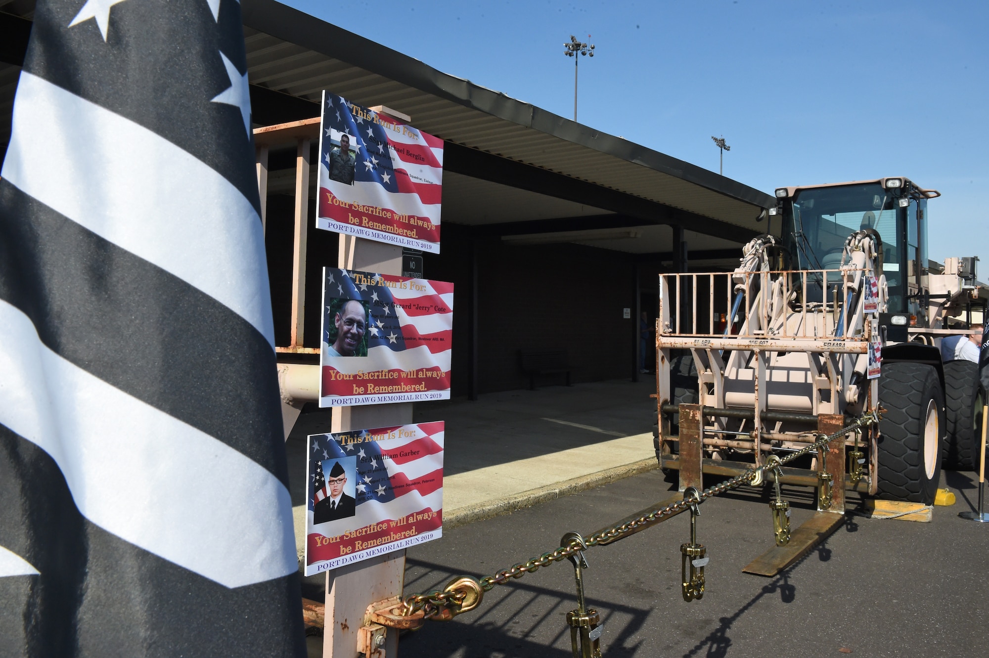 A memorial display is set up ahead of time for the Port Dawg Memorial Run ceremony at Joint Base McGuire-Dix-Lakehurst, N.J. May 17, 2019. The Port Dawg Memorial Run honors aerial porters who lost their lives the previous year. (U.S. Air Force photo by Staff Sgt. Sarah Brice)