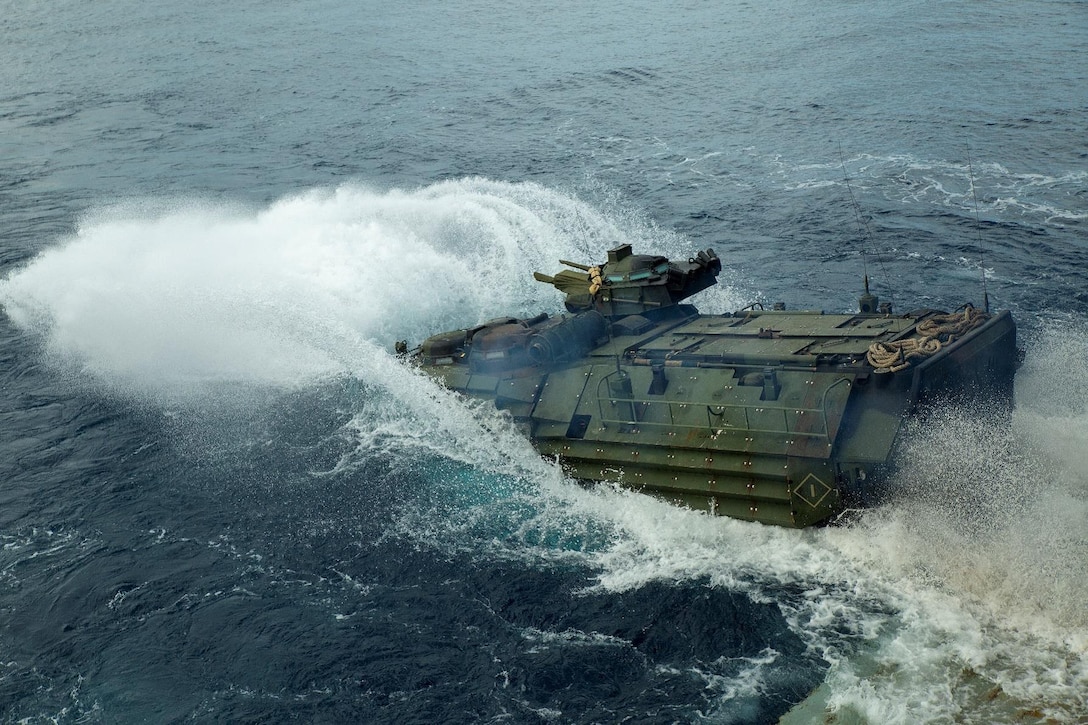 The U.S. Marines of Company B, Battalion Landing Team 1/4, 31st Marine Expeditionary Unit, conducting ship to shore movement from USS Green Bay (LPD-20) to White Beach, Okinawa, Japan for a mechanized raid during Amphibious Integration Training (AIT), Jan. 28, 2019. AIT is conducted in preparation for Certification Exercise, and to ensure readiness for crisis response throughout the Indo-Asia-Pacific region.