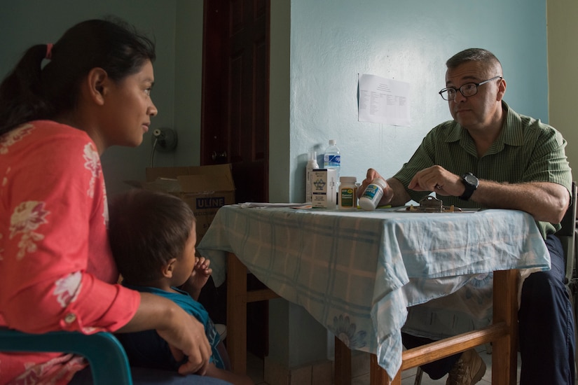 U.S. Army Maj. Jorge Chavez, Joint Task Force – Bravo Medical Element public health nurse, speaks with a patient about preventive medicine during a Pediatric Medical Readiness Training Exercise May 23, 2019 in La Paz, Honduras. MEDRET missions allow JTF-B medical personnel to train in their areas of expertise, while providing a service and strengthening partnership with the host nation. The service members saw approximately 120 patients during the mission. (U.S. Air Force photo by Staff Sgt. Eric Summers Jr.)