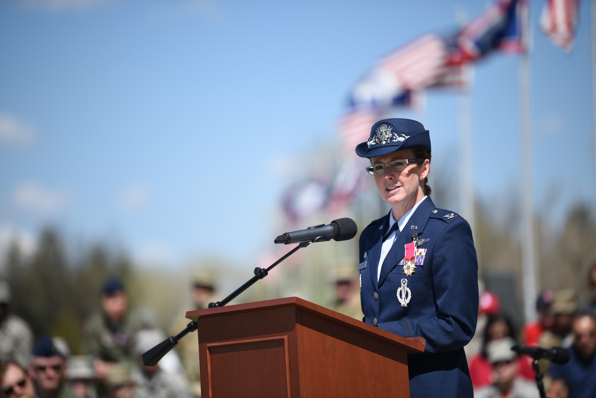 Colonel Stacy Jo Huser, 90th Missile Wing outgoing commander, gives her speech during the change of command ceremony on the Argonne Parade Field at F.E. Warren Air Force Base, Wyo., May 31, 2019. Huser thanked the 90th MW for supporting her through her command, giving special thanks to her husband and children for their support at home.  (U.S. Air Force photo by Staff Sgt. Ashley N. Sokolov)