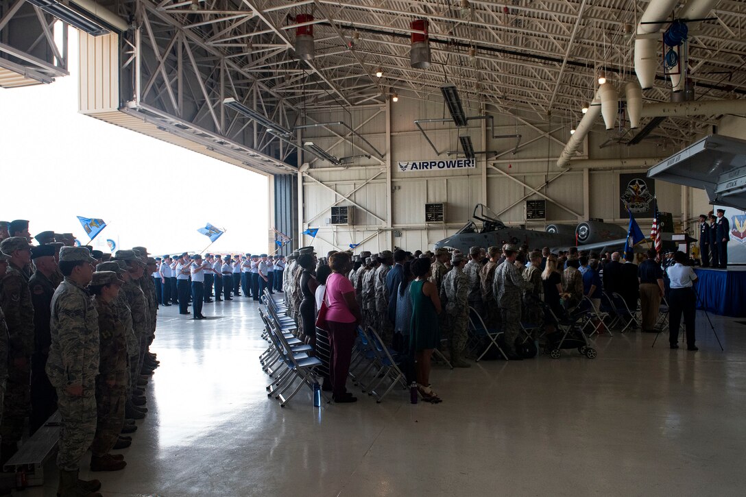 Attendees watch a change of command ceremony, May 31, 2019, at Moody Air Force Base, Ga. The ceremony is a military tradition that represents a formal transfer of a unit’s authority and responsibility from one commander to another. (U.S. Air Force photo by Senior Airman Erick Requadt)