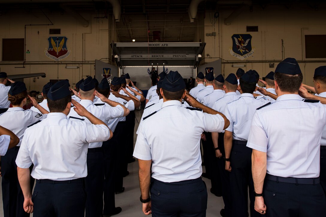 Airmen from the 23d Wing (WG) render their first salute to Col. Daniel P. Walls, 23d WG commander, during a change of command ceremony, May 31, 2019, at Moody Air Force Base, Ga. The ceremony is a military tradition that represents a formal transfer of a unit’s authority and responsibility from one commander to another. (U.S. Air Force photo by Senior Airman Erick Requadt)