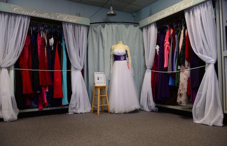 A photo of dresses on display in the thrift shop on Beale.